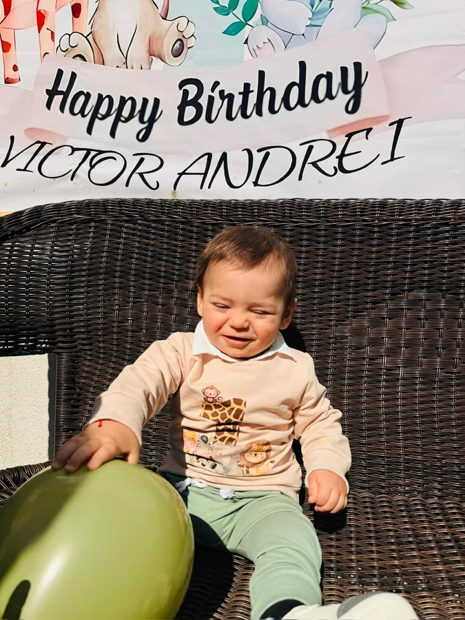 A baby's first birthday celebrated in the Casa Fratila courtyard
